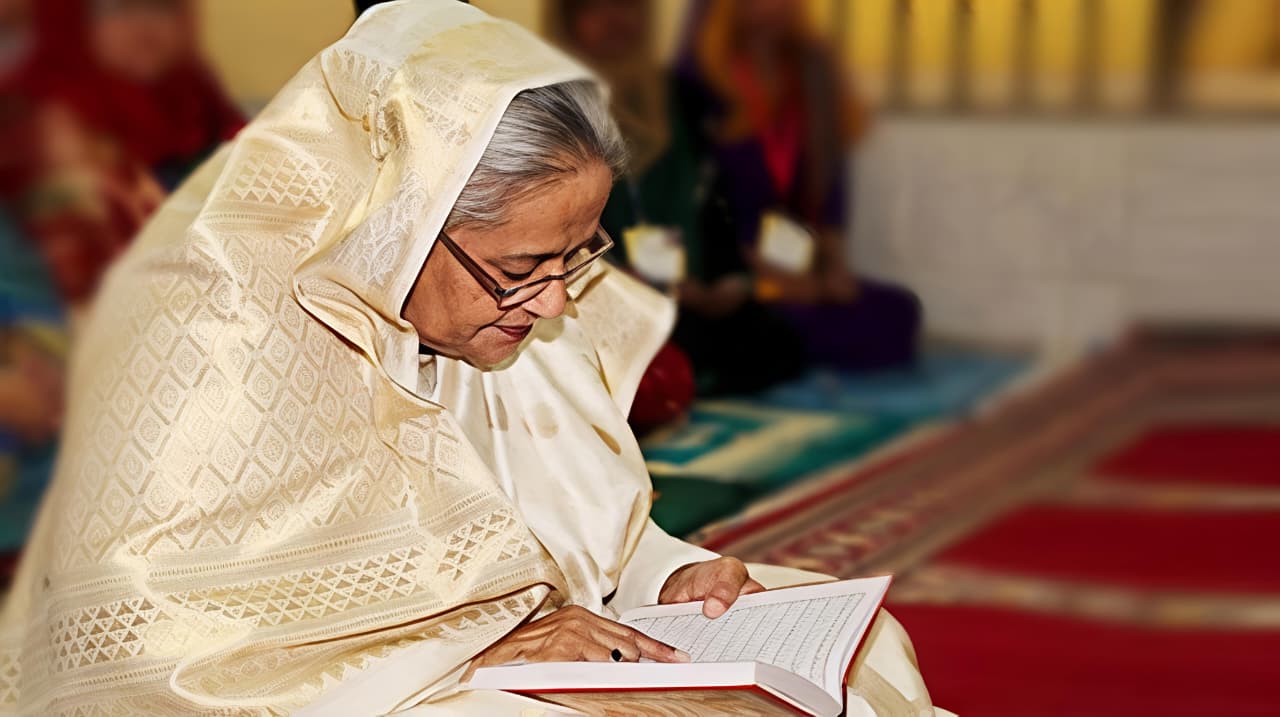 Sheikh Hasina reading in quiet reflection